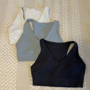 Four small paragon sports bras - white, light blue, dark grey, light green